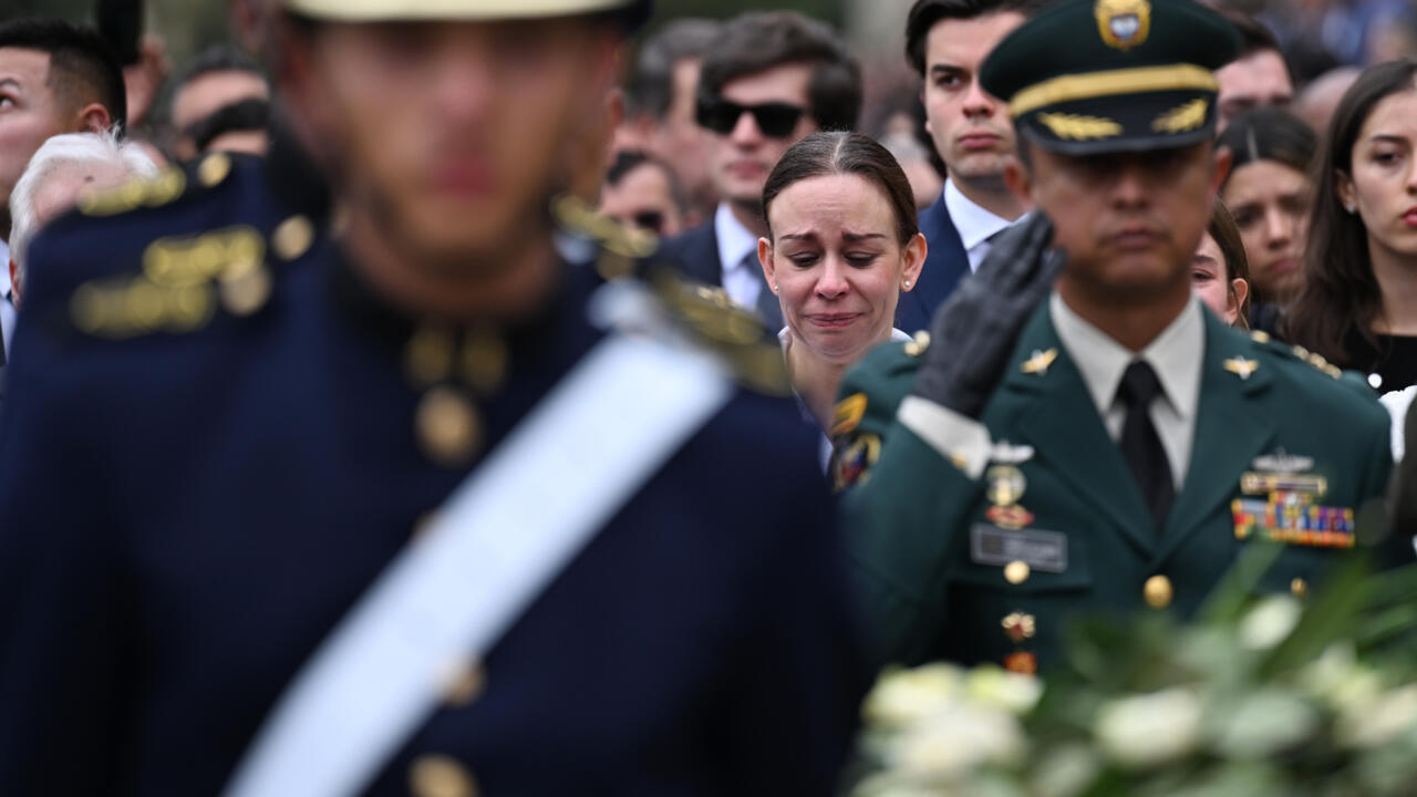 COLOMBIA MOURNS AND BURIES ASSASSINATED PRESIDENTIAL CANDIDATE
