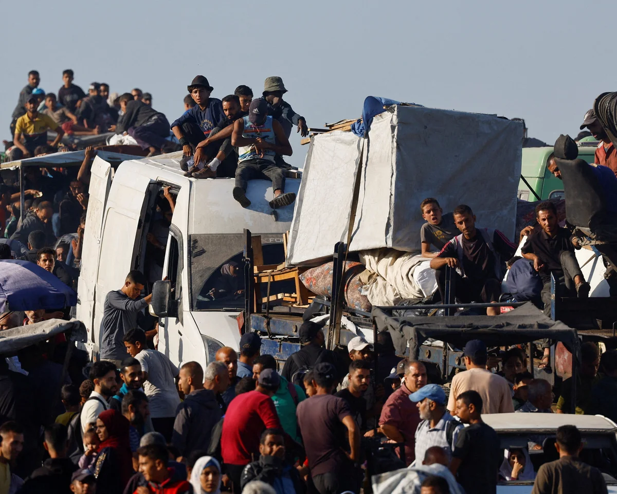 THOUSANDS OF PALESTINIANS RETURN TO GAZA AFTER TRUMP-BROKERED CEASEFIRE
